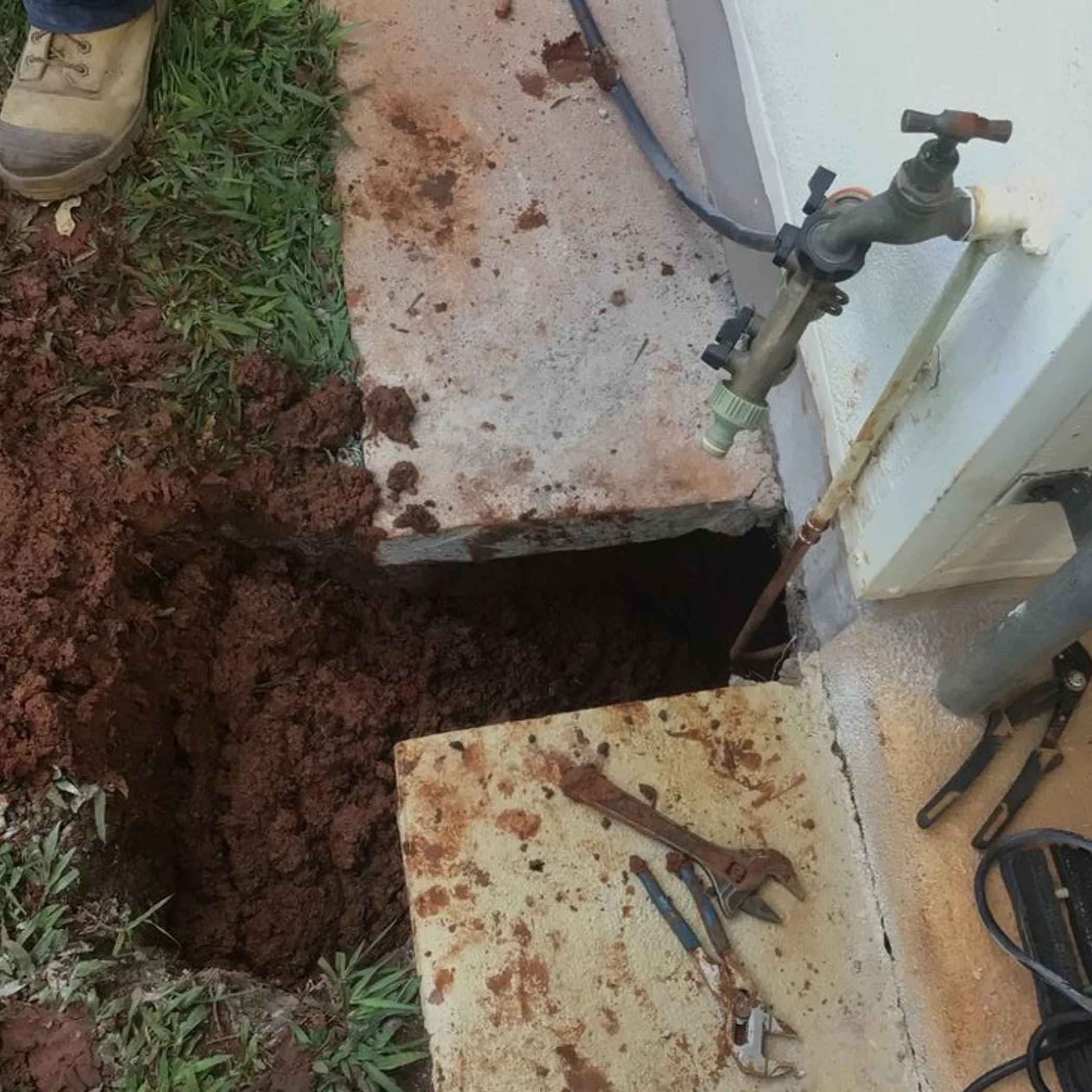 exposed plumbing repair and water connection